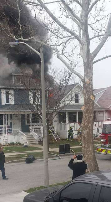 Windsor firefighters battle blaze on Hickory St. in Windsor, March 23, 2016. (Submitted photo)