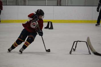 Students at the FJ Brennan Centre of Excellence & Innovation Hockey Canada Skills Academy take part in practice, March 5, 2015. (Photo by Mike Vlasveld)