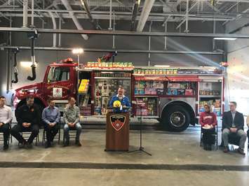 Lambton College Fire School Associate Dean Andre Ouellette thanks NOVA for donating a pumper truck to the school. December 20, 2019 Photo by Melanie Irwin