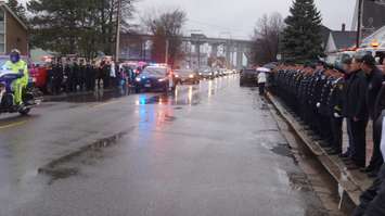 Crowds lined Michigan Ave. Monday to remember former Pt. Edward Mayor Dick Kirkland. December 21, 2015 (BlackburnNews.com Photo by Briana Carnegie)