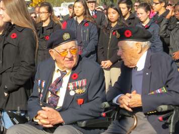 Two veterans chat before the 2015 Remembrance Day ceremony in London. Photo by Miranda Chant, BlackburnNews.com