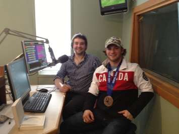 Tyler McGregor shows off his bronze medal while appearing on CHOK's The Sports  Show Mar. 25, 2014