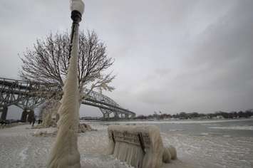 Strong winds and bitterly cold air coat the St. Clair River waterfront with ice Jan. 15, 2018 (BlackburnNews.com photo by Dave Dentinger)