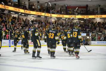 The Sarnia Sting celebrate an overtime win over the Saginaw Spirit in Game 2 of the west semifinal. 16 April 2023. Metcalfe Photography. 