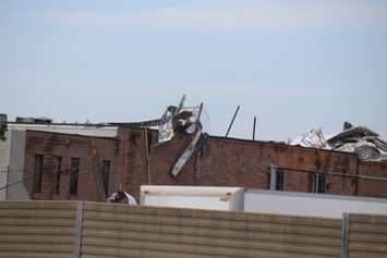 Crews assess and clean up the damage left near the EC Row Expressway and Central Avenue in Windsor on August 25, 2016 after a tornado hit the area. (Photo by Ricardo Veneza)