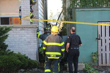 Firefighters at the scene of a fire at a restaurant at Wyandotte St. E and Marion Ave. in Windsor, October 12, 2015.  (Photo by Adelle Loiselle)