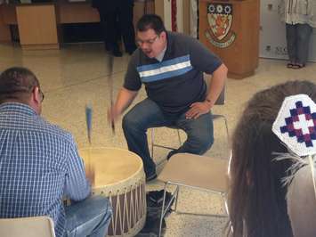 Members of Eagle Flight Drum take part in a signing ceremony at St.Clair College, September 22, 2015. (Photo by Adelle Loiselle)