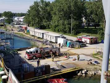 Fire crews respond to a blaze aboard a motor vessel docked in Sarnia, July 6, 2017. (Photo courtesy of Point Edward Fire and Rescue)