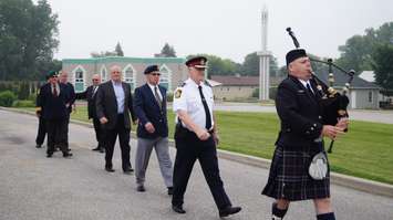 Global Donuts on London Line officially raised the Canadian flag and unveiled a memorial plaque Tuesday. June 30, 2015 (BlackburnNews.com Photo by Briana Carnegie)