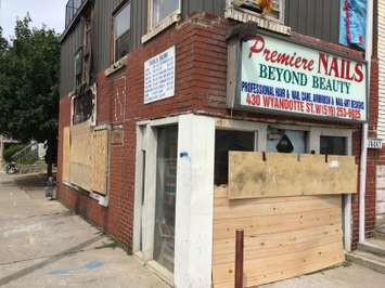 Fire crews responded to a Premiere Nails on Wyandotte St. W, June 24, 2015. (Photo by Jason Viau)