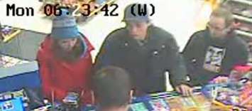 The Amherstburg Police Service is looking for three people, caught on surveillance at a Mac's Milk convenience store in Tecumseh, January 13, 2017. (Photo courtesy the Amherstburg Police Service)