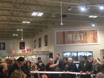 Cutting the ribbon on the new store on Toronto Street South in Markdale. (Submitted photo)