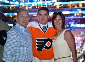 18-year-old Travis Konecny with his parents Rob and Terri at the 2015 NHL draft where he was selected 24th overall by the Philadelphia Flyers. (Photo by Martin Steele)