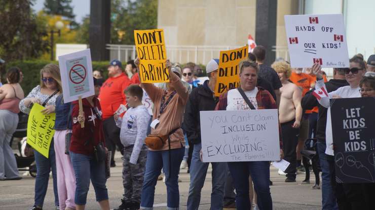 Protestors and counter protestors at the '1 Million March for Children' protest outside Sarnia City Hall. 20 September 2023. (Photo by SarniaNewsToday.ca)