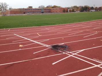 Photo of apparent burn mark on  Sarnia Central Athletics track. Nov. 4, 2014 (photo by Jake Jeffrey blackburnnews.com)