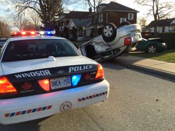 Windsor police respond to a rollover accident at the intersection of Pierre Ave. and Ellis St. E on December 1, 2014. (Photo by Jason Viau)