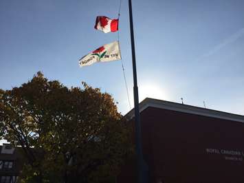 Branch 62 members, Sarnia police officers and Mayor Mike Bradley  gather to raise a Lest We Forget Flag. November 1, 2016 BlackburnNews.com photo by Melanie Irwin