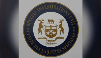 Special Investigations Unit logo. 