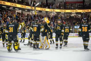 The Sarnia Sting celebrate an overtime win over the Saginaw Spirit in Game 2 of the west semifinal. 16 April 2023. Metcalfe Photography. 