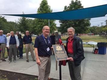 Sarnia-Lambton Golden K Kiwanis President Mike Shimmin and Mayor Mike Bradley unveil a plaque dedicating a new pavilion at McGibbon Park. August 29, 2017 Photo by Melanie Irwin