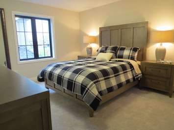 An upstairs bedroom inside the Dream Lottery home at 2397 Meadowlands Way. (Photo by Miranda Chant, Blackburn News)