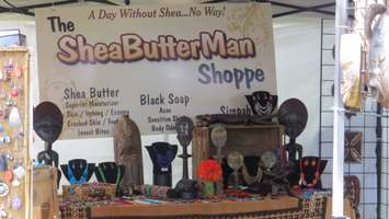 The SheaButterMan Shoppe, owned and operated by Thomas Amoah, at Sunfest, July 8, 2016. (Photo by Samuel Gallant)
