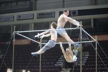 Acrobats practice on stage during a media preview for Cirque du Soleil's 'Corteo', at the WFCU Centre in Windsor, May 15, 2019. Photo by Mark Brown/Blackburn News.