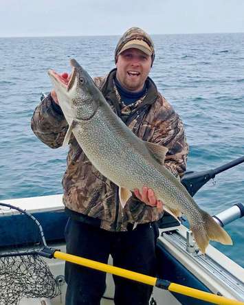 Justin Tadgell of Grand Bend in the Lake Trout category with a 20.36 lb. Lake Trout. (Photo by Bluewater Anglers)