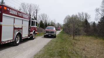 Sarnia Fire and Rescue on scene of a large grass fire off Michigan Ave. near the Howard Watson Nature Trail. May 9, 2018. (Photo by Colin Gowdy, BlackburnNews)