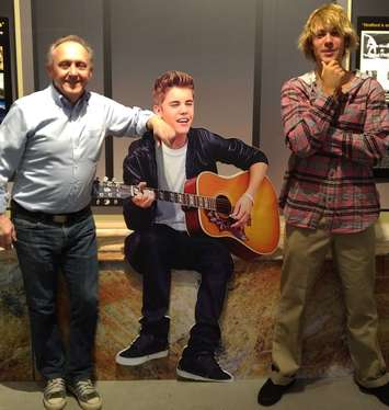 John Kastner, GM of the Stratford Perth Museum, with Justin Bieber and Bieber exhibit. (Picture courtesy of John Kastner)