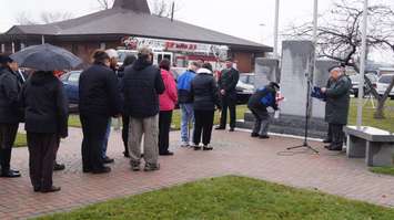 Community members take part in laying of the poppies. November 10, 2015 (BlackburnNews.com Photo by Briana Carnegie)