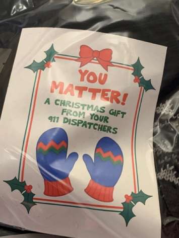 911 Dispatchers bought mittens, hats, socks, pocket warmers & 
TimHortons
 gift cards that will be handed out by local police officers to those in our community who are in need. (Photo courtesy of Chatham-Kent police)