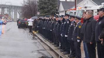 Crowds lined Michigan Ave. Monday to remember former Pt. Edward Mayor Dick Kirkland. December 21, 2015 (BlackburnNews.com Photo by Briana Carnegie)