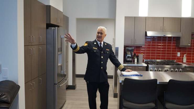 Fire Chief Bryan Van Gaver shows kitchen and conjoined living room. January 30, 2024. (Photo by Natalia Vega) 