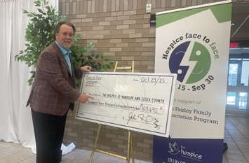 Hospice Face to Face campaign founder John Fairley reveals total for the 23rd annual campaign, October 29, 2025. (Photo by Maureen Revait) 