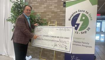 Hospice Face to Face campaign founder John Fairley reveals total for the 23rd annual campaign, October 29, 2025. (Photo by Maureen Revait) 