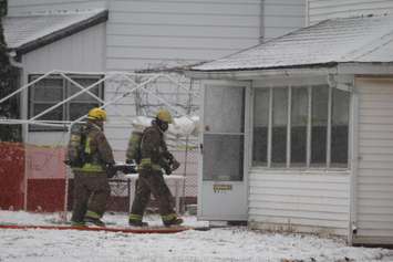 Crews attend the scene of a fire at 120 Wellington St. E in Chatham, February 9, 2016 (Photo by Jake Kislinsky)