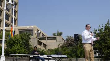Sarnia Councillor Bill Dennis speaking at a flag raising ceremony at the Seaway Centre Parkette in Sarnia. May 31, 2019. (Photo by Colin Gowdy, BlackburnNews)