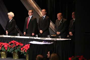 (From left to right) Jo-Anne Gignac, Irek Kusmierczyk, Bill Marra, Hilary Payne, Paul Borrelli are introduced to the crowd at the Chrysler Theatre at the beginning of Windsor Council's inaugural meeting, December 1, 2014. (photo by Mike Vlasveld)