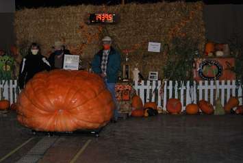 2020 Pumpkinfest winners for biggest pumpkin. Jane Hunt, Phil Hunt and Chris Lyons with the 1939.5 pound pumpkin. (Submitted photo)