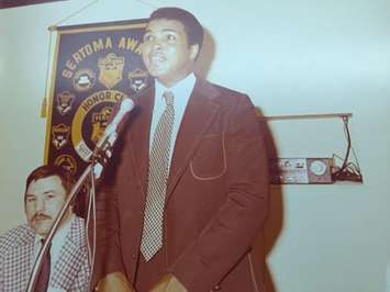 Muhammad Ali speaks to a crowd at the Sarnia Sertoma Sports Celebrity Dinner in 1974. (Photo submitted by  former Blackburn Sports Director George Heath)  
