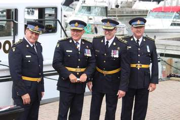 Former OPP Commissioner Chris Lewis (second from left) attends the naming ceremony for the largest OPP marine vessel, which now carries his name, held at the Leamington Marina on June 23, 2016. (Photo by Ricardo Veneza)