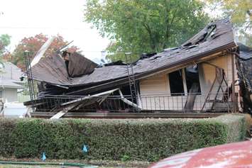 Officials from the Office of the Ontario Fire Marshal are investigating a house explosion in the 1400-block of Francois Rd. in Windsor, October 21, 2015.  (Photo by Adelle Loiselle)