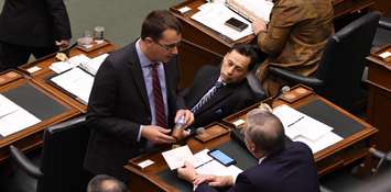 Lambton-Kent-Middlesex MPP Monte McNaughton delivers dirty well water to Environment Minister Chris Ballard. November 21, 2017 (Submitted photo.)