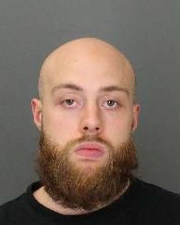 A photo released by police of 26-year-old Dustin Schuh from Windsor wanted in connection with a homicide investigation. (Photo courtesy the Windsor Police Service)