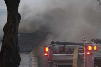Windsor fire crews battle a blaze at 1574 Gladestone Ave., April 7, 2015. (Photo by Jason Viau)