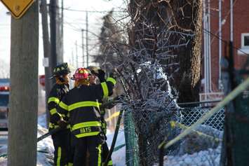 Firefighters at the scene of two house fires in the 800-block of Assumption St. in Windsor March 2, 2015. (Photo by Adelle Loiselle.)