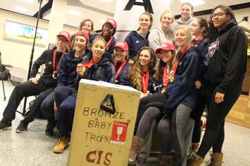 Windsor Lancers women's basketball team arrives at Windsor airport after winning their fifth-straight national championship. (Photo by Jason Viau)