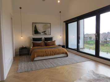 An upstairs bedroom at the Millstone Dream Home  on  Silver Creek Circle. (Photo by Miranda Chant, Blackburn News) 