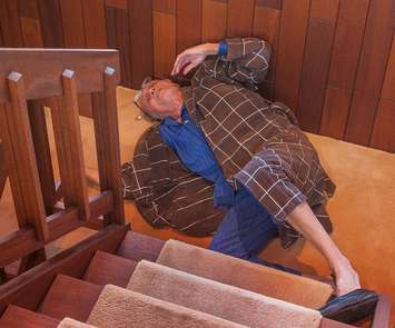 An elderly man trying to get up after falling down the stairs. File photo courtesy of  © Can Stock Photo / Babar760